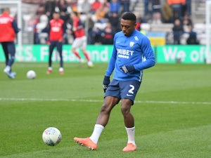 Preston's Darnell Fisher charged by FA over alleged genital grab