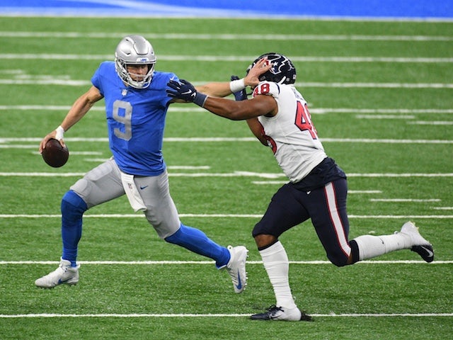 Houston Texans linebacker Nate Hall in action with Detroit Lions quarterback Matthew Stafford on November 26, 2020