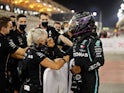 Lewis Hamilton celebrates after sealing pole position in qualifying for the Bahrain Grand Prix on November 28, 2020