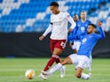 Arsenal's Joe Willock in action with Molde's Etzaz Hussain in the Europa League on November 26, 2020