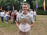 Bake Off winner Peter Sawkins poses with his trophy