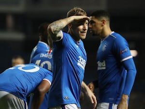 Benfica fight back to earn draw with Rangers at Ibrox