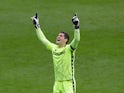 Reading goalkeeper Rafael celebrates after his side score against Bristol City in the Championship on November 28, 2020