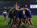Jack Welsby celebrates his winning try against Wigan Warriors with St Helens teammates in the Super League Grand Final on November 27, 2020