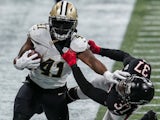 New Orleans Saints running back Alvin Kamara in action with Atlanta Falcons safety Ricardo Allen in the NFL on December 6, 2020