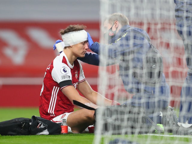 Arsenal's David Luiz is bandaged up following his clash of heads with Wolves' Raul Jimenez on November 29, 2020