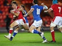 Wales' Kieran Hardy runs through to score their first try in the Autumn Nations Cup on December 5, 2020