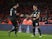 Burnley's Ashley Westwood and Dwight McNeil celebrate an own goal against Arsenal on December 13, 2020