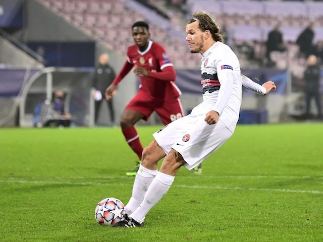 FC Midtjylland's Alexander Scholz scores against Liverpool in the Champions League on December 9, 2020