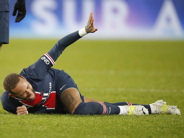 Paris Saint-Germain's Neymar reacts after sustaining an injury against Lyon in Ligue 1 on December 13, 2020