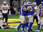 Los Angeles Rams defense celebrates after sacking New England Patriots quarterback Cam Newton on December 11, 2020
