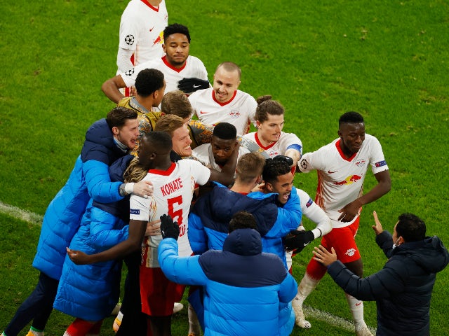 RB Leipzig celebrate after Justin Kluivert scores against Manchester United in the Champions League on December 8, 2020
