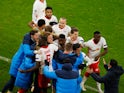 RB Leipzig celebrate after Justin Kluivert scores against Manchester United in the Champions League on December 8, 2020