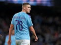 Taylor Harwood-Bellis in action for Manchester City in January 2020