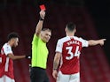 Arsenal's Granit Xhaka is shown a red card against Burnley on December 13, 2020
