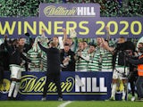 Celtic players and staff celebrate winning the Scottish Cup final on December 20, 2020