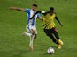 Huddersfield Town's Fraizer Campbell in action with Watford's Ismaila Sarr on December 19, 2020