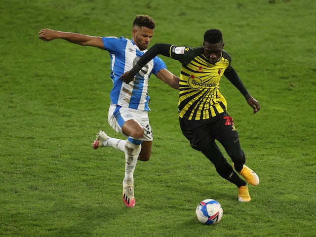 Huddersfield Town's Fraizer Campbell in action with Watford's Ismaila Sarr on December 19, 2020