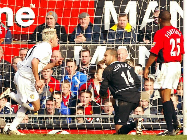 A general shot of Alan Smith scoring against Manchester United for Leeds United in 2004