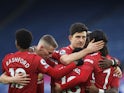 Manchester United players celebrate their second goal against Leicester on December 26, 2020