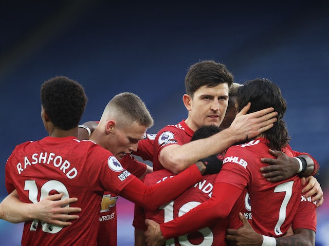 Manchester United players celebrate their second goal against Leicester on December 26, 2020