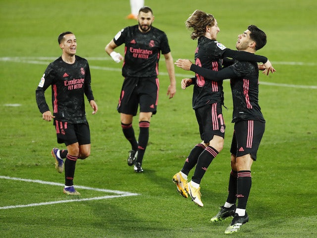 Real Madrid's Luka Modric celebrates scoring against Elche in La Liga on December 30, 2020