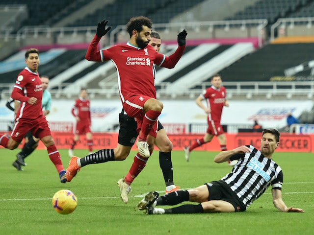 Liverpool's Mohamed Salah in action with Newcastle United's Federico Fernandez in the Premier League on December 30, 2020