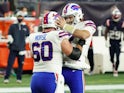 Buffalo Bills quarterback Josh Allen reacts with center Mitch Morse against the New England Patriots on December 28, 2020