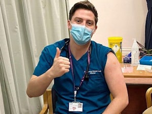 Doctor Alex receives coronavirus vaccine