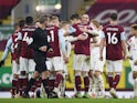 Burnley celebrate after beating MK Dons on penalties in the FA Cup on January 9, 2021