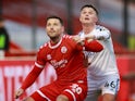 Crawley Town's Mark Wright in action with Leeds United's Jamie Shackleton in the FA Cup on January 10, 2021
