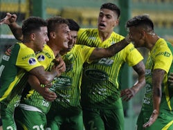 Defensa y Justicia's Brian Romero celebrates scoring their first goal against Bahia with teammates in December 2020