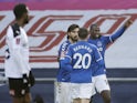 Everton's Abdoulaye Doucoure celebrates scoring their second goal with teammates in the FA Cup third round on January 9, 2021