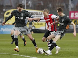 Exeter City's Matt Jay in action with Sheffield Wednesday's Liam Shaw and Ciaran Brennan on January 9, 2021