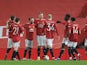 Manchester United players celebrate Scott McTominay's opener against Watford on January 9, 2021