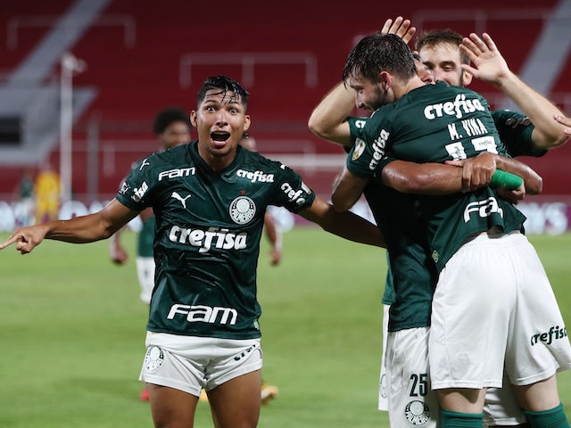 Palmeiras' Matias Vina celebrates scoring their third goal with teammates on January 6, 2021