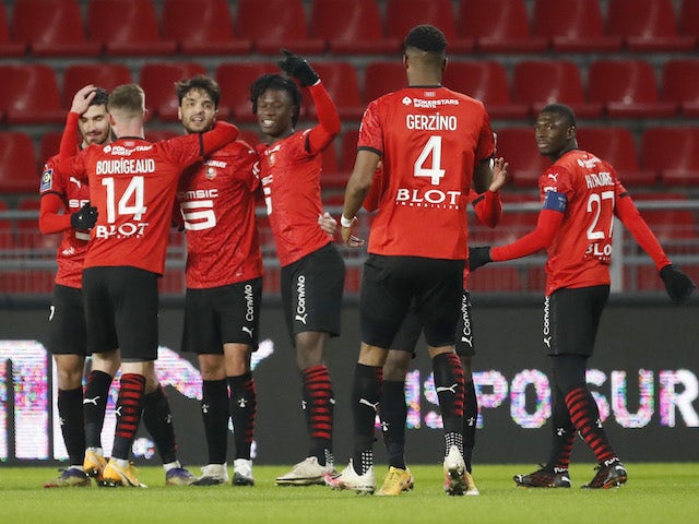 Rennes' Clement Grenier celebrates scoring their first goal with teammates on January 9, 2021