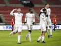 Lyon's Jason Denayer celebrates with teammates after scoring against Rennes on January 9, 2021