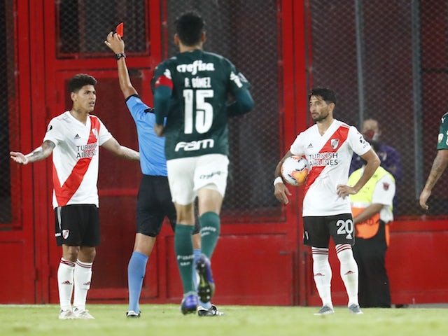 River Plate's Jorge Carrascal is shown a red card by referee Luis Gonzalez on January 6, 2021