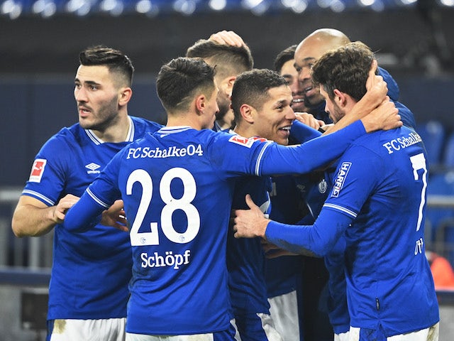 Schalke 04 players celebrate their second goal scored by Matthew Hoppe on January 9, 2021