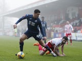 Swansea City's Ben Cabango in action with Stevenage's Danny Newton on January 9, 2021