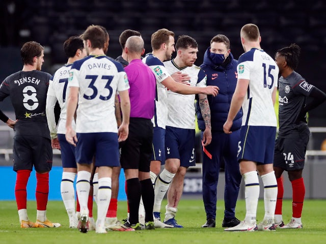 Tottenham Hotspur's Pierre-Emile Hojbjerg goes off injured against Brentford in the EFL Cup on January 5, 2021