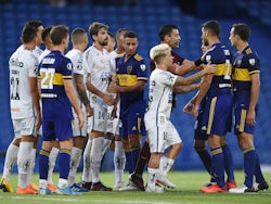 Santos and Boca Juniors players clash during half time of their Copa Libertadores semi-final in January 2021