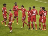 Bayern Munich's Thomas Muller celebrates scoring their second goal with teammates on January 17, 2021