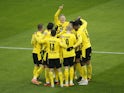 Borussia Dortmund's Erling Braut Haaland celebrates scoring a goal with teammates before it is disallowed following a referral to VAR on January 16, 2021