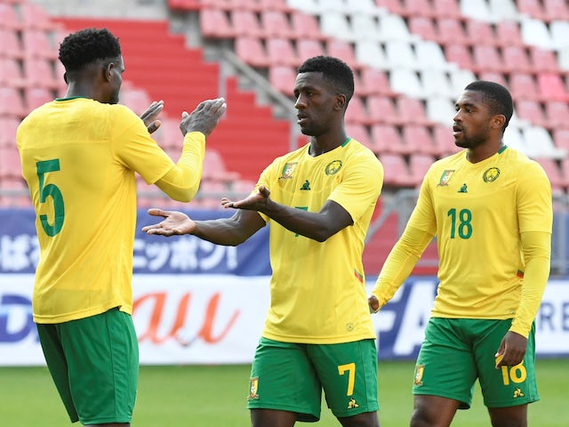 Cameroon's Samuel Gouet, Michael Ngadeu-Ngadjui and Franck Evina after the match in October 2020