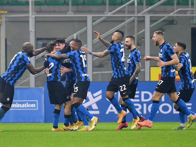 Inter Milan's Nicolo Barella celebrates scoring their second goal with teammates on January 17, 2021