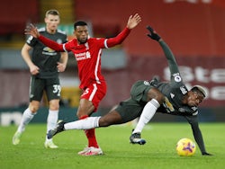 Manchester United's Paul Pogba in action with Liverpool's Georginio Wijnaldum in the Premier League on January 17, 2021