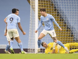 Manchester City's John Stones celebrates scoring against Crystal Palace in the Premier League on January 17, 2021