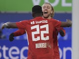 RB Leipzig's Nordi Mukiele celebrates scoring their first goal with Emil Forsberg on January 16, 2021